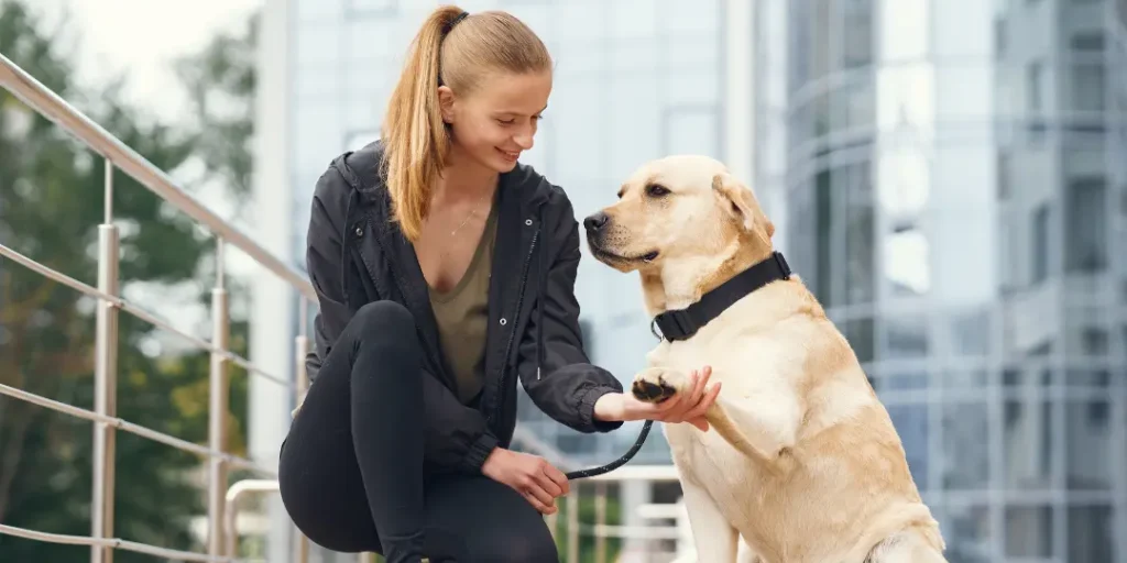 Portrait of a woman with her beautiful dog